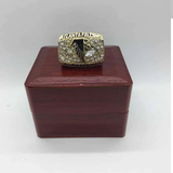 Front view of the 1998 Atlanta Falcons NFC Championship Ring Replica featuring the Falcons logo in black and red, surrounded by sparkling Cubic Zirconia stones on a gold Zinc Alloy band