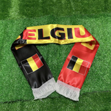 Belgian flag-themed scarf with 'BELGIUM' text on a green grass background
