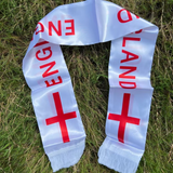 England Scarf with red crosses and 'ENGLAND' text on grass