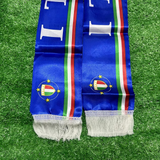 Blue scarf with Italian flag design on a grass background