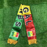 Senegal Supporter  scarf with 'SENEGAL' text and Senegalese flag on a green grass background