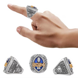 Hand wearing a Fantasy Football Championship Ring 2024 with close-up views on a white background