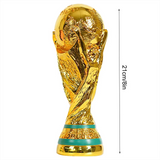 Gold trophy with dimensions indicated on a white background