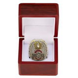 Ohio State ring in a wooden box on a white background